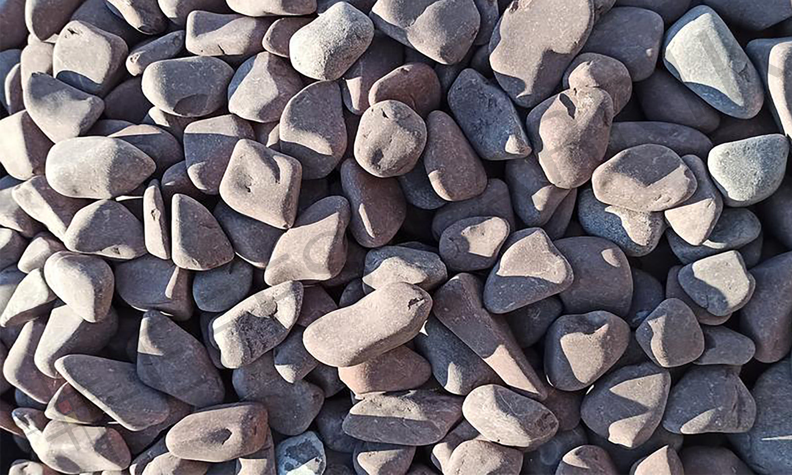 rosso laguna pebble stone